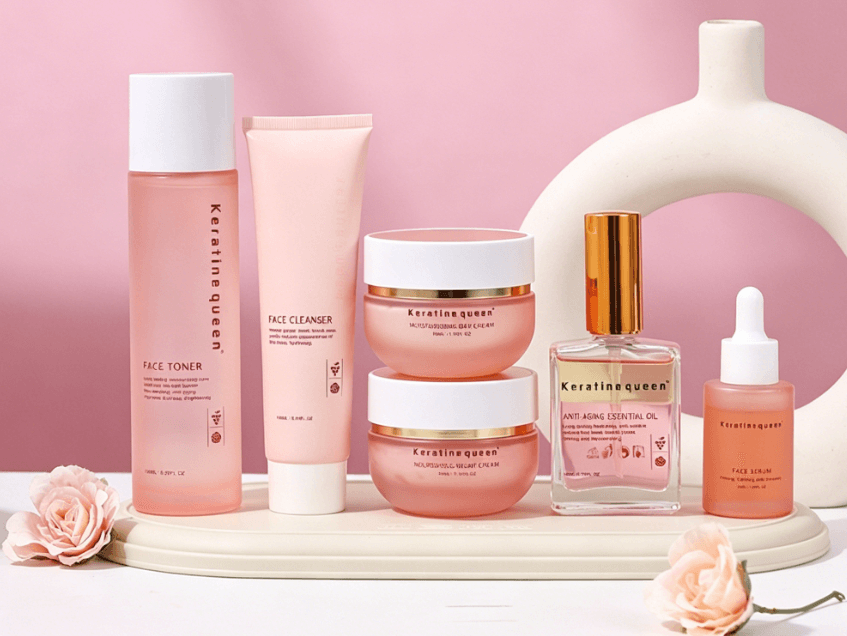 Pink Keratine queen skincare products including toner, cleanser, and creams arranged on a tray.